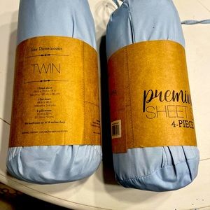 Brand new. 2 twin sheet sets